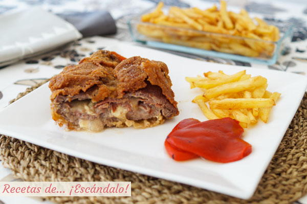 Receta de cachopo asturiano de ternera con patatas fritas y pimientos del piquillo