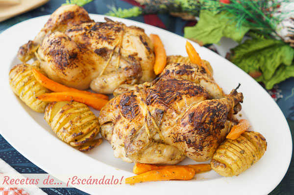 Receta de picantones al horno con patatas hasselback y zanahorias baby